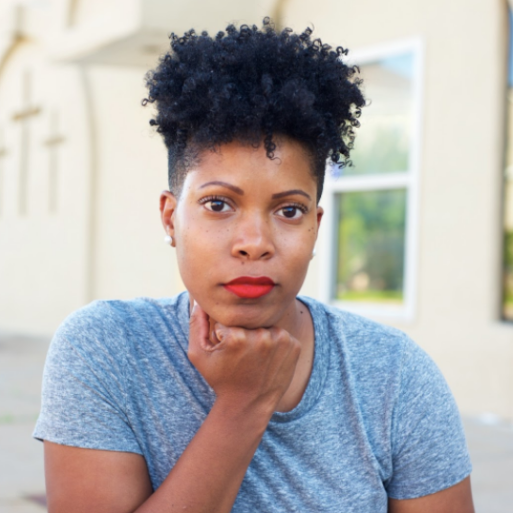 pensive young black woman with short hair